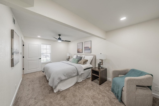 bedroom with light carpet and ceiling fan