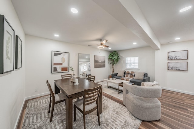 dining space featuring hardwood / wood-style floors and ceiling fan