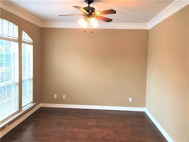 unfurnished room with crown molding, ceiling fan, and dark hardwood / wood-style flooring