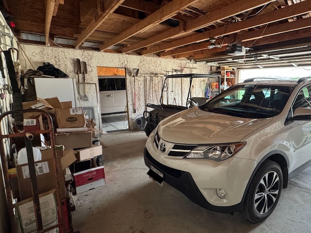 garage featuring a garage door opener