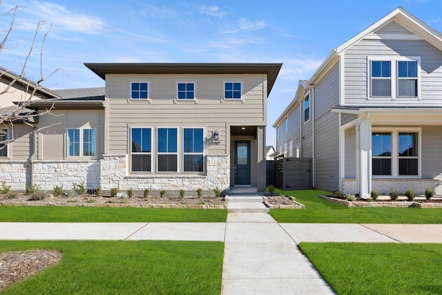 view of front of property with a front lawn