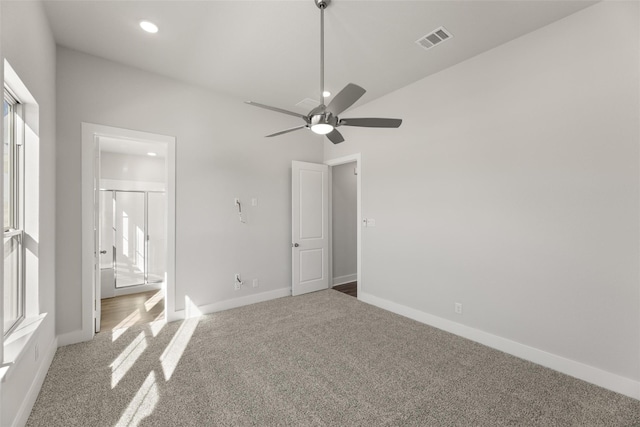 unfurnished bedroom featuring ceiling fan and carpet