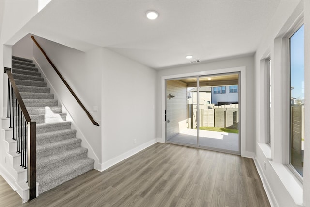 interior space with hardwood / wood-style floors