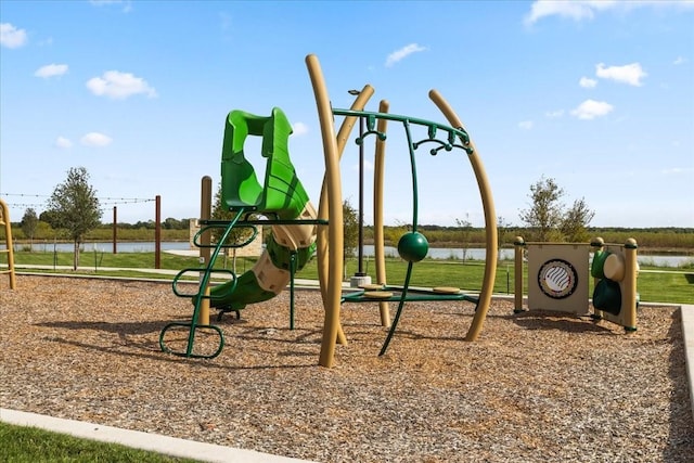 view of playground featuring a water view