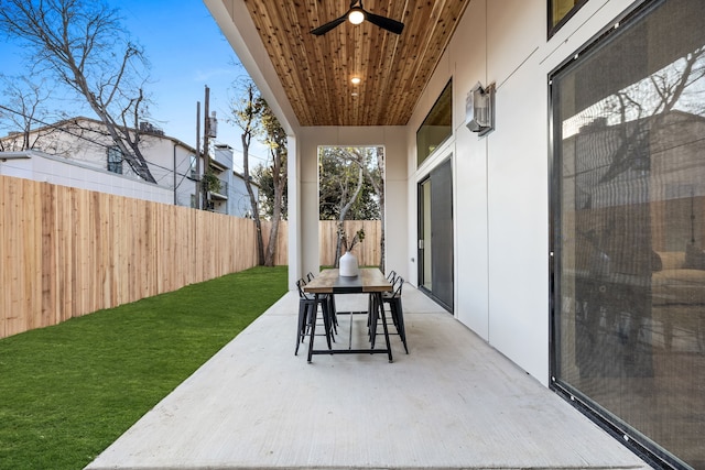 view of patio with ceiling fan