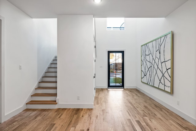 entryway with light hardwood / wood-style floors