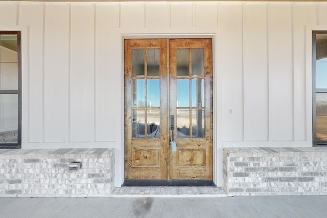 property entrance featuring french doors