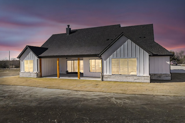 modern farmhouse featuring a patio