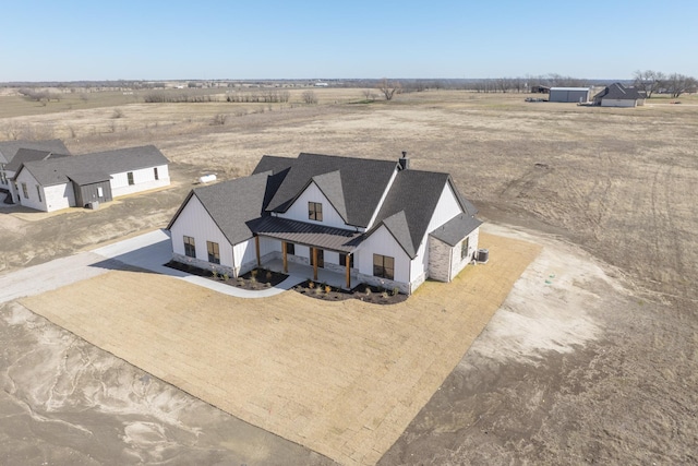 drone / aerial view featuring a rural view