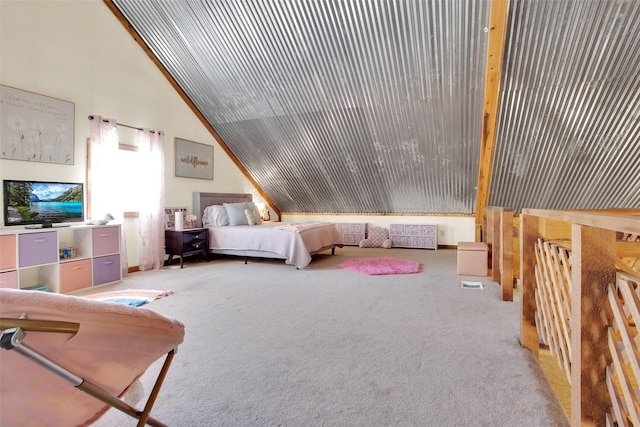 carpeted bedroom featuring vaulted ceiling