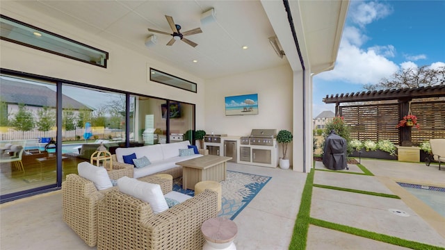 view of patio / terrace with a grill, an outdoor living space, ceiling fan, and an outdoor kitchen