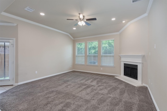 unfurnished living room featuring light carpet, vaulted ceiling, ornamental molding, and ceiling fan