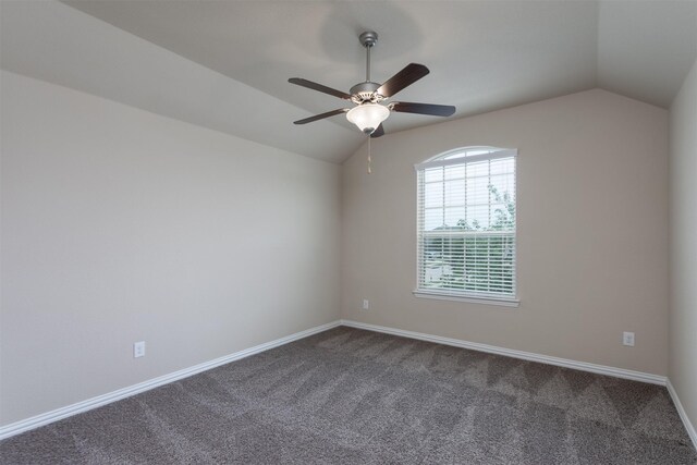 rear view of property featuring ceiling fan, a yard, and a patio