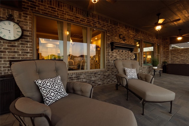 view of patio featuring ceiling fan