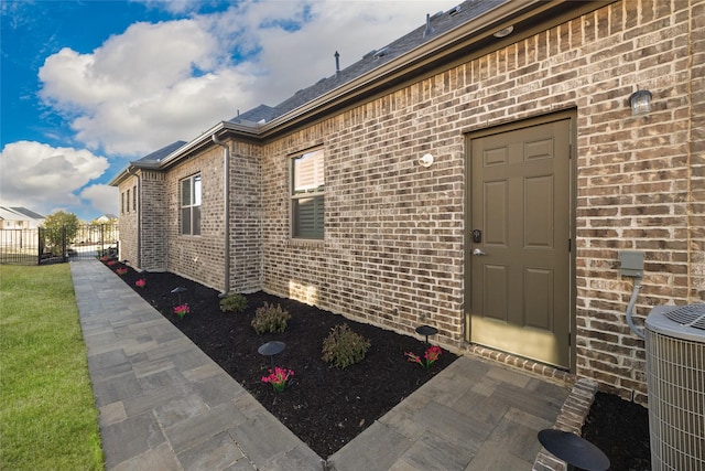 property entrance with central air condition unit