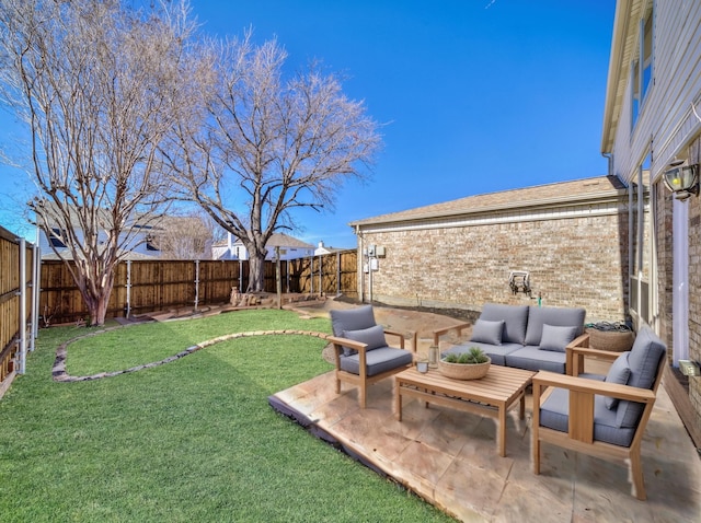 view of yard featuring a patio area, outdoor lounge area, and a fenced backyard