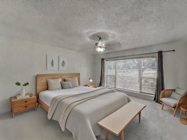 carpeted bedroom with a textured ceiling