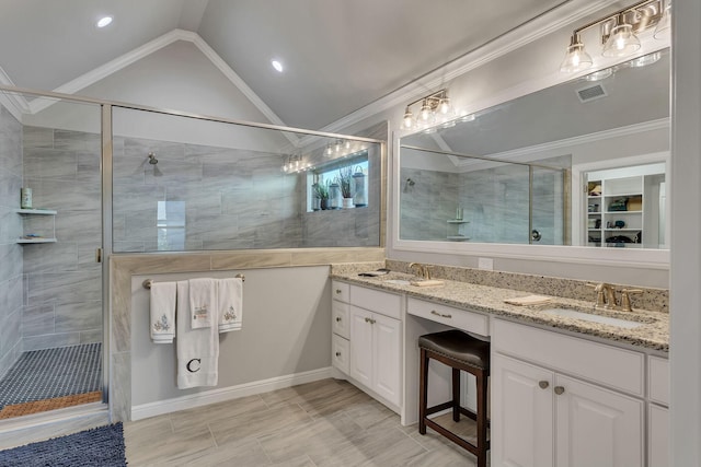 bathroom featuring walk in shower, lofted ceiling, and ornamental molding