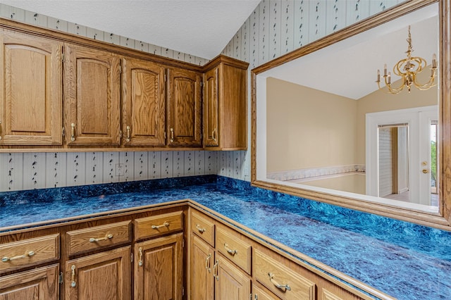 kitchen with a chandelier