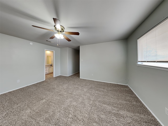 unfurnished room with carpet floors and ceiling fan