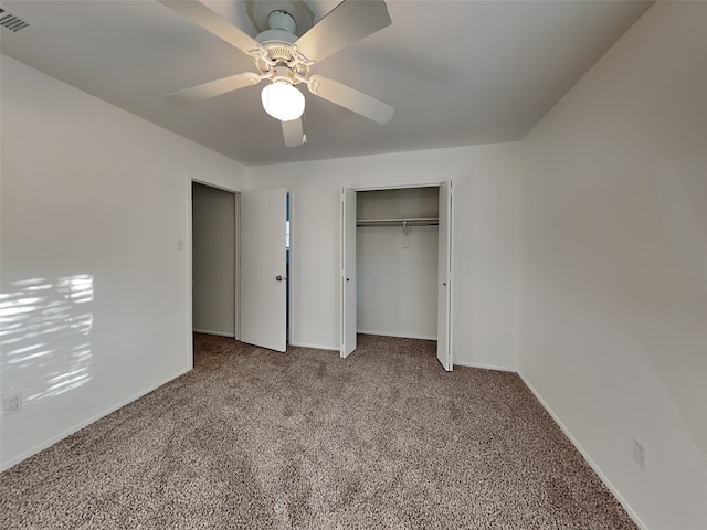 unfurnished bedroom featuring a closet, ceiling fan, and carpet flooring