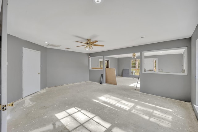 interior space featuring ceiling fan