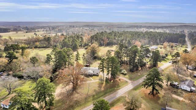 birds eye view of property featuring a rural view