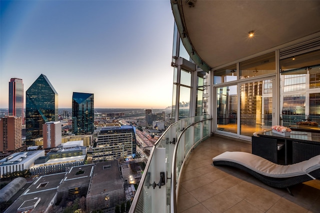 view of balcony at dusk