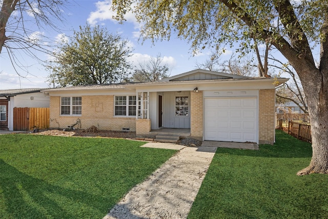 ranch-style house with a garage and a front lawn