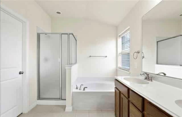 bathroom with vanity, tile patterned floors, and separate shower and tub