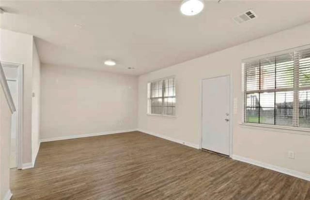 entrance foyer featuring dark wood-type flooring