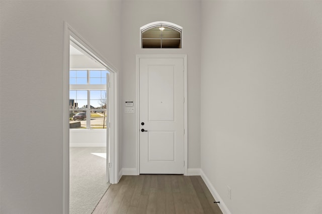 doorway to outside with light wood-type flooring