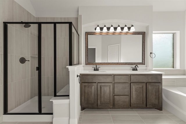 bathroom featuring vanity, independent shower and bath, and tile patterned flooring