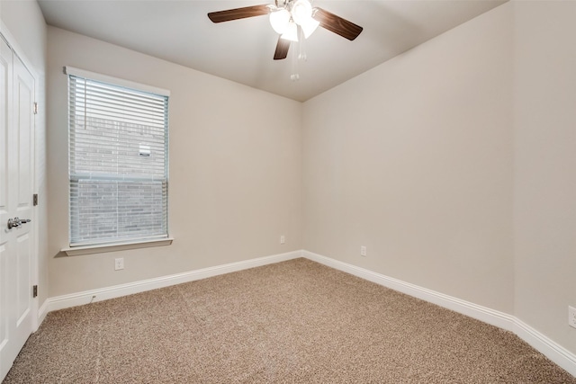 unfurnished room featuring carpet floors and ceiling fan