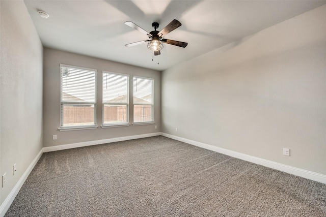 unfurnished room featuring carpet floors and ceiling fan