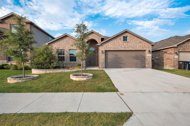 craftsman-style home with a garage and a front yard