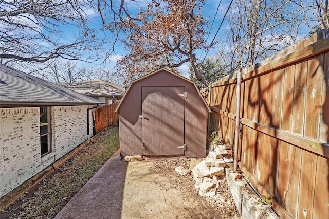 exterior space with a storage shed