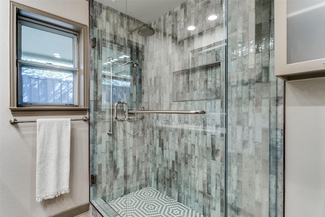 bathroom featuring walk in shower