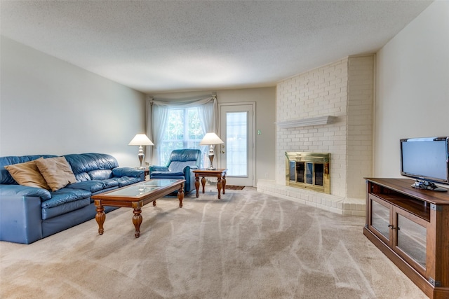 living room featuring a fireplace, light colored carpet, and a textured ceiling