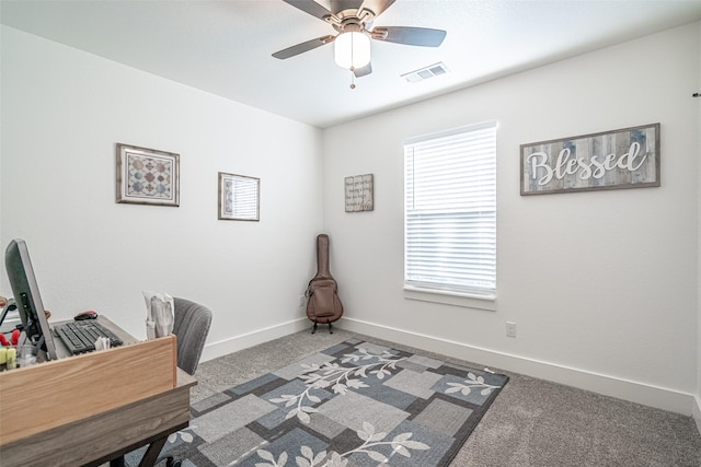 office area with carpet and ceiling fan