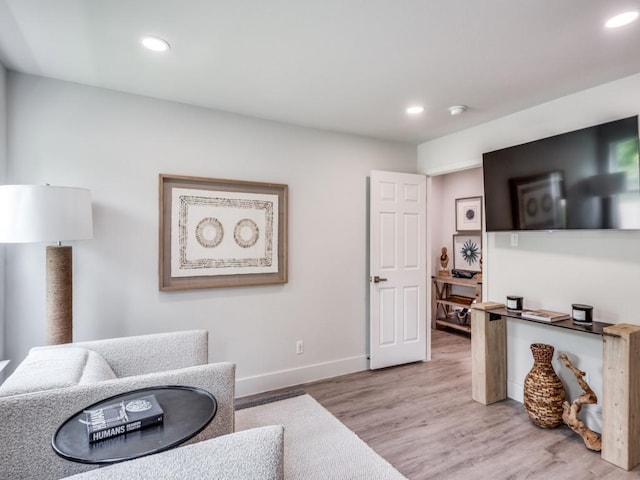 living area featuring hardwood / wood-style flooring