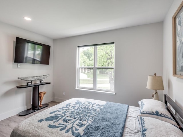 bedroom with light wood-type flooring