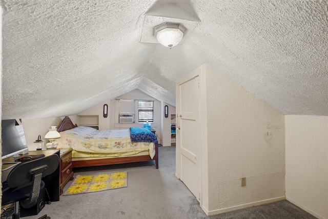 bedroom with cooling unit, lofted ceiling, carpet floors, and a textured ceiling