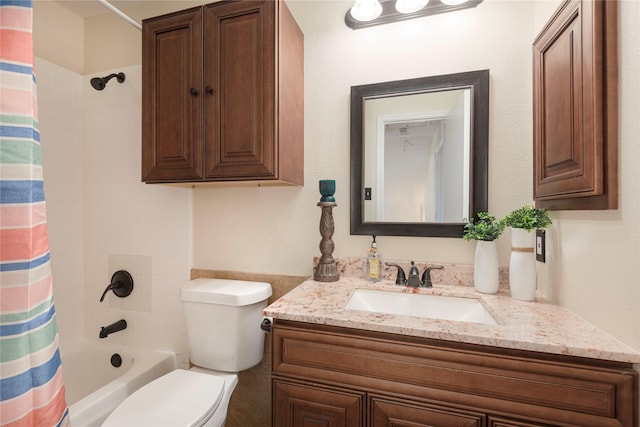 full bathroom featuring vanity, shower / bath combination with curtain, and toilet