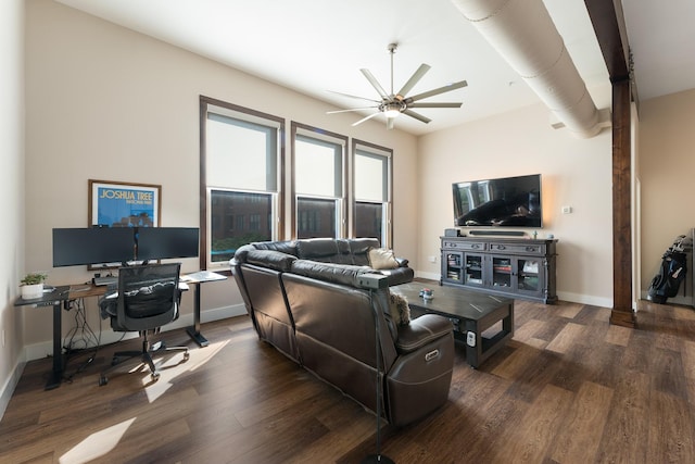 living room featuring ceiling fan and dark hardwood / wood-style floors