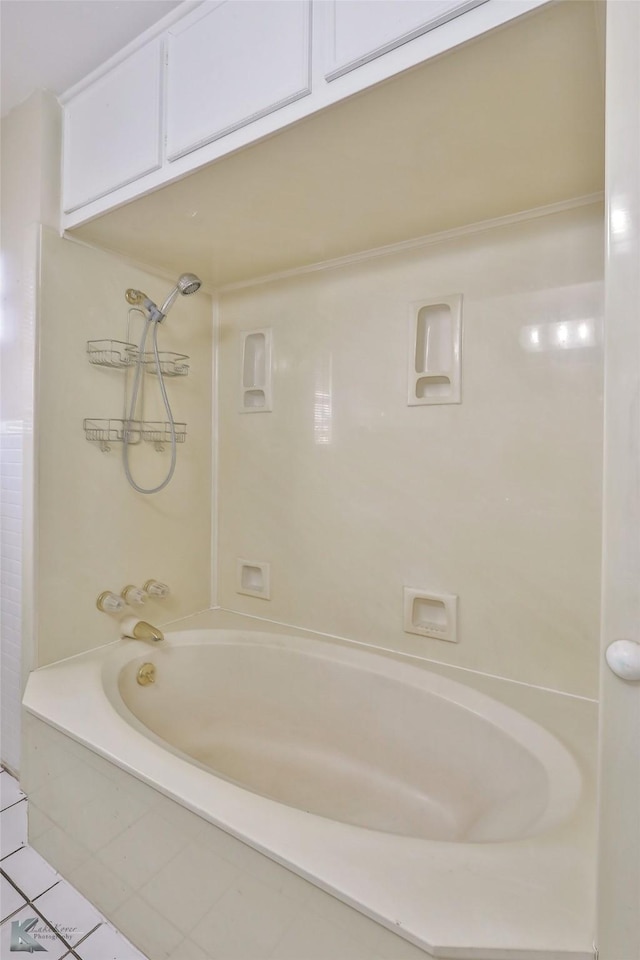 bathroom featuring  shower combination and tile patterned flooring