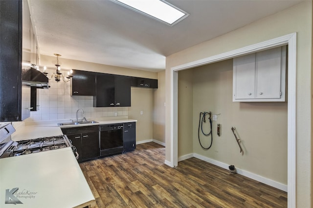 kitchen featuring range with gas cooktop, tasteful backsplash, dishwasher, sink, and dark hardwood / wood-style flooring