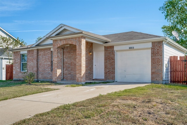 ranch-style home featuring a garage and a front lawn