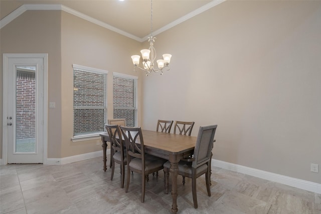 tiled dining area featuring crown molding and a chandelier