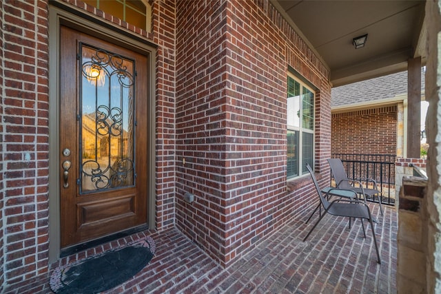 doorway to property featuring a porch